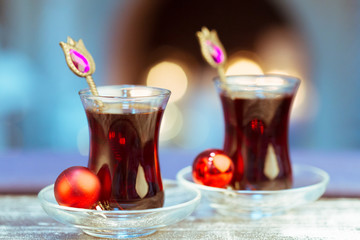 Christmas hot  tea, and light bokeh