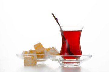 Turkish tea in traditional glass isolated on white background