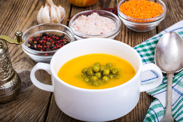 Soup puree from red lentils and canned green peas