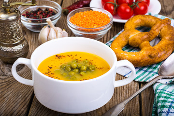 Soup puree from red lentils and canned green peas