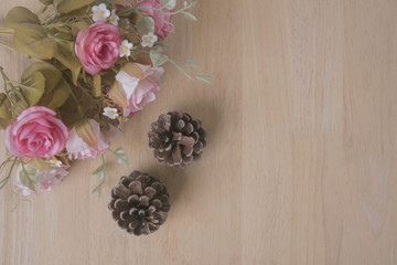 flower decoration on wood table with panel banner with copy space.