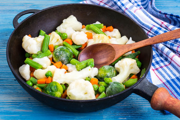 Pan with frozen vegetable mix for frying