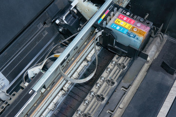 Naklejka premium Old, dirty, disassembled ink jet printer. View of internal parts.