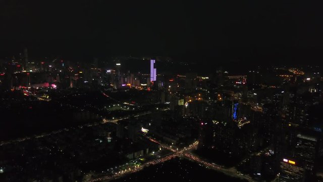 night time illuminated shenzhen city aerial panorama 4k china
