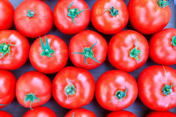 Organic red tomatoes at farmers' market.