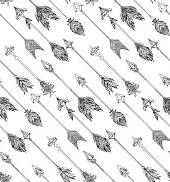Seamless texture with boho arrows with different tips and plumage. Vector doodle pattern for your creativity