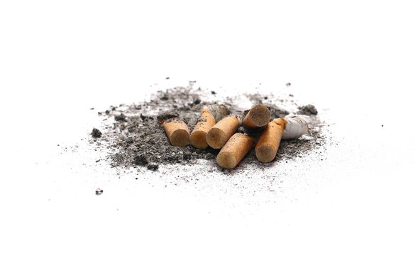 Cigarette stubs and ash isolated on white background