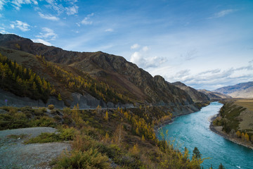 Fototapeta na wymiar Mountainous summer landscape with a turquoise river.