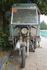 Vintage motorcycle delivery truck in Hanoi Vietnam