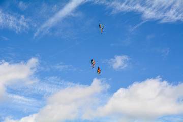 Naklejka na ściany i meble Three identical kites in the sky on day two of the Kite Festival in Russell Park Bedford Bedfordshire England