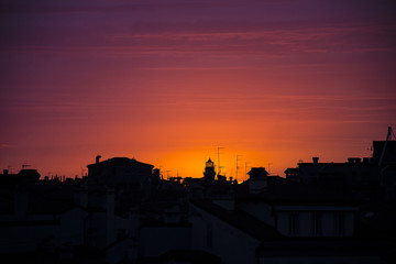 Sunset on lighthouse Trieste