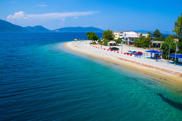 Pefki, Evia island, Greece July 25, 2014: The coast where the ferry is located at Pefki town in Evia island.