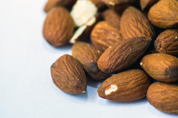 Almonds close up photo. Macro photography of a almond pile.