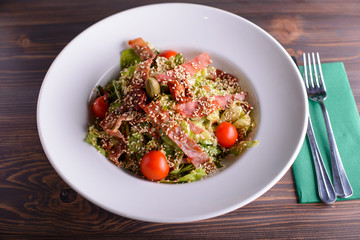 salad meal with meat and cheese