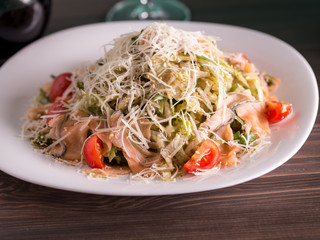  salad meal with smoked fish and cheese