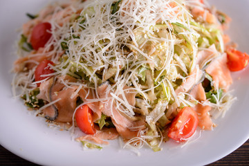 salad meal with smoked fish and cheese