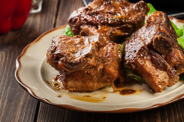 Pork spare ribs served on a plate