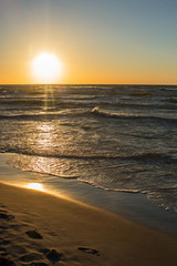 Fototapeta premium romantic sunset on the sea shore,