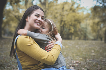 Mother and daughter share love.