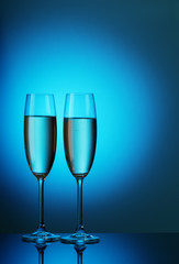 Two crystal glasses with champagne