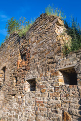 Walls of ruined castle in Mykulyntsi village, Ukraine