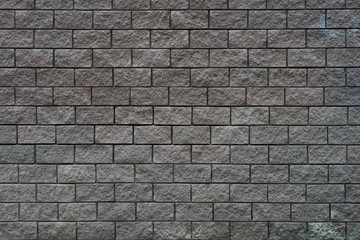 Black brick stone texture background.