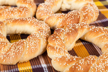 Freshly baked homemade simit with sesame seeds closeup