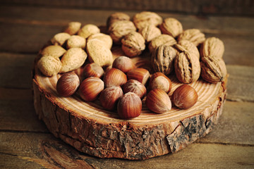 Variety of nuts on wood