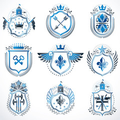 Fototapeta premium Set of vector vintage emblems created with decorative elements like crowns, stars, bird wings, armory and animals. Collection of heraldic coat of arms.