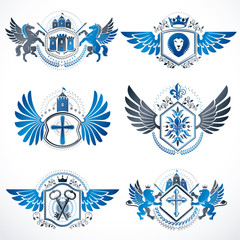 Fototapeta na wymiar Heraldic vector signs decorated with vintage elements, monarch crowns, religious crosses, armory and animals. Set of classy symbolic graphic insignias with bird wings.