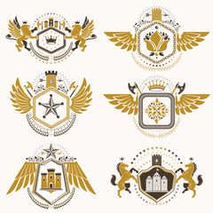 Vintage decorative heraldic vector emblems composed with elements like eagle wings, religious crosses, armory and medieval castles, animals. Collection of classy symbolic illustrations.