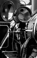 Steam locomotive detail in black and white. 