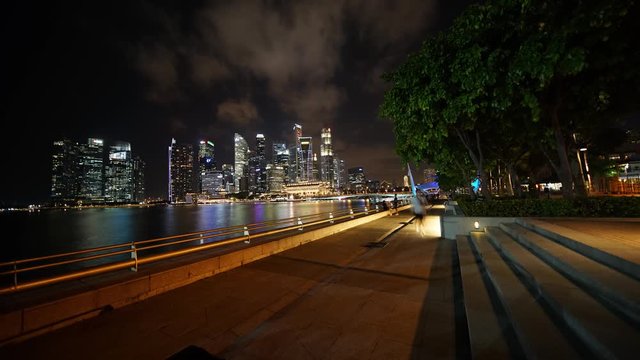 Singapore - November 27, 2017: Timelapse footage of beautiful cityscape in Marina Bay Sands Singapore at night. Shot in 4k resolution