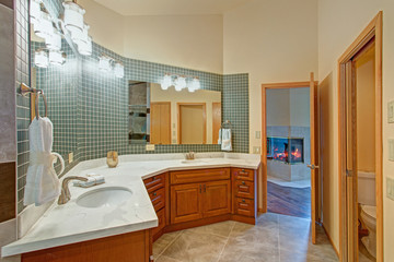 Stunning bathroom with a double vanity with marble top.