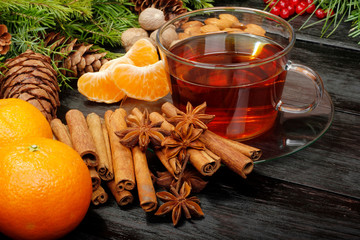 tee with mandarines on christmas background