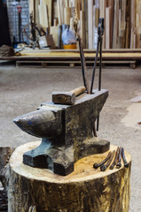 Iron anvil and blacksmith's tools / The picture is taken in the production room