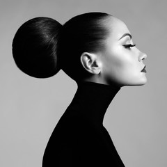 Beautiful elegant woman in black turtleneck - obrazy, fototapety, plakaty