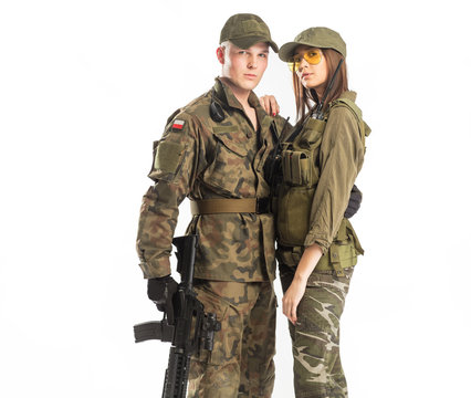 Man and woman in soldier's suit on white background