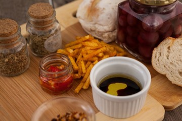 Close up of food with jar on cutting boards