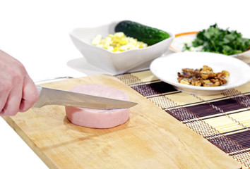 Sliced ham for the meat salad with walnuts
