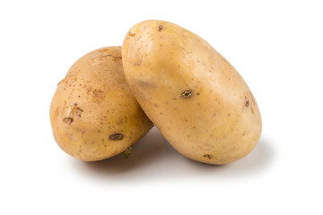 Uncooked fresh potatoes isolated on a white background