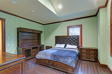 Wedding venue interior features a welcoming mint bedroom