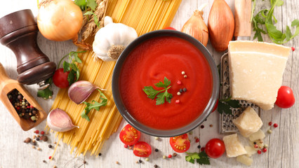 tomato sauce with ingredients for meal