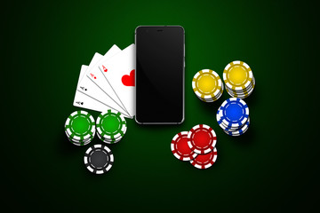 Online casino, mobile casino, mobile phone, chips cards on a green background. Gambling games. View from above.