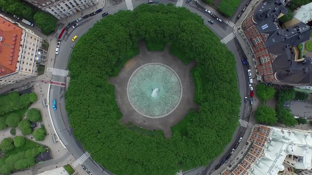 Drone shot of Karlaplan Park, Square and Fountain, located in the city of Stockholm, Sweden.