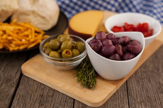 Olives and vegetable by french fries with bread