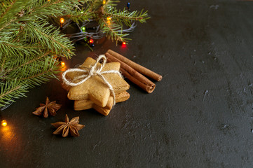 Christmas gingerbread cookies on black background.