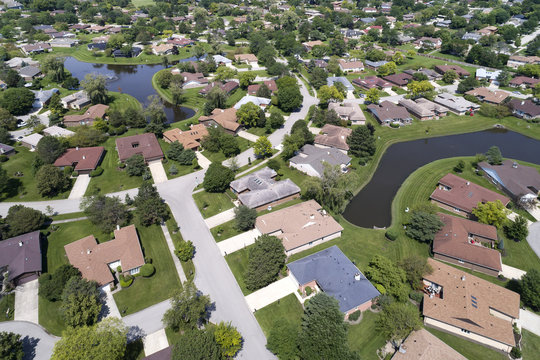 Neighborhood Aerial View With Ponds
