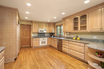 Kitchen with oak wood cabinetry