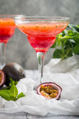 Alcoholic cocktail with fresh passion fruit